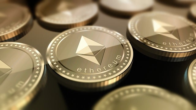 *Ethereum Price Prediction*—Multiple gold-colored Ethereum coins arranged in a tight, repeating pattern, symbolizing cryptocurrency investment and the fluctuating value of digital assets.