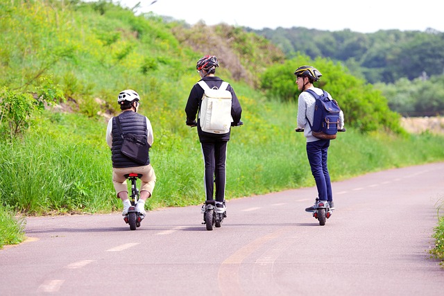 Three individuals riding electric scooters on a paved path, surrounded by greenery, visually symbolizing **Three Types of Funding**—highlighting financial mobility, investment choices, and sustainable economic growth.