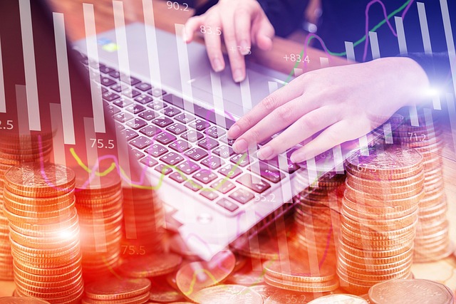 Two hands holding a stack of coins near a laptop, representing financial planning and the current economic situation in 2025.
