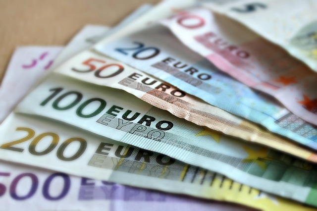 Several Euro banknotes of different denominations, representing financial diversity and the **Best Funds to Invest in 2025**.