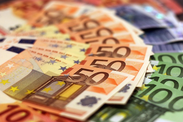 A pile of Euro banknotes representing Financial Freedom, symbolizing wealth accumulation and financial independence.