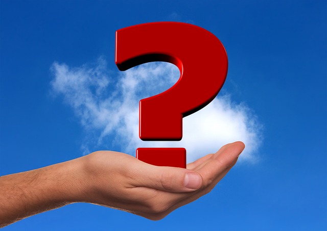 A large red question mark against a blue sky, symbolizing **Most Searched Personal Finance Questions** and financial curiosity.